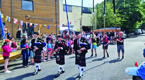 1 ML 03 Three pipers from the Malahide Pipe Band playing a the annual launching of the boats parade for the Malahide Scouts WEB