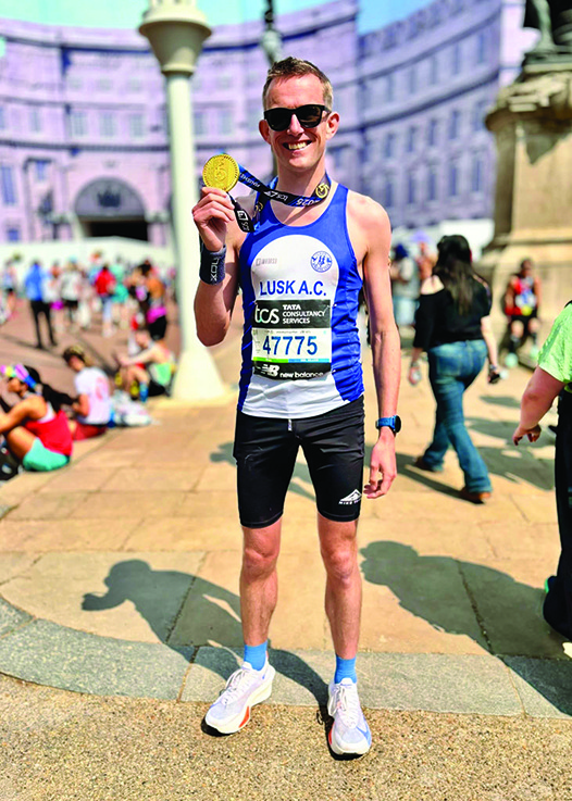 6 LL 10 Paddy celebrating after a very warm London Marathon WEB