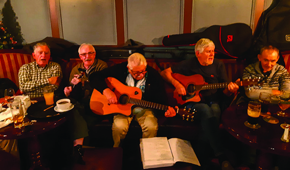 2 DL 02 Mens Shed Christmas dinner sing song in Keelings